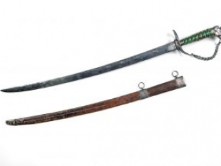 Eighteenth-century slightly curved sword with a green stained hilt alongside a leather scabbard
