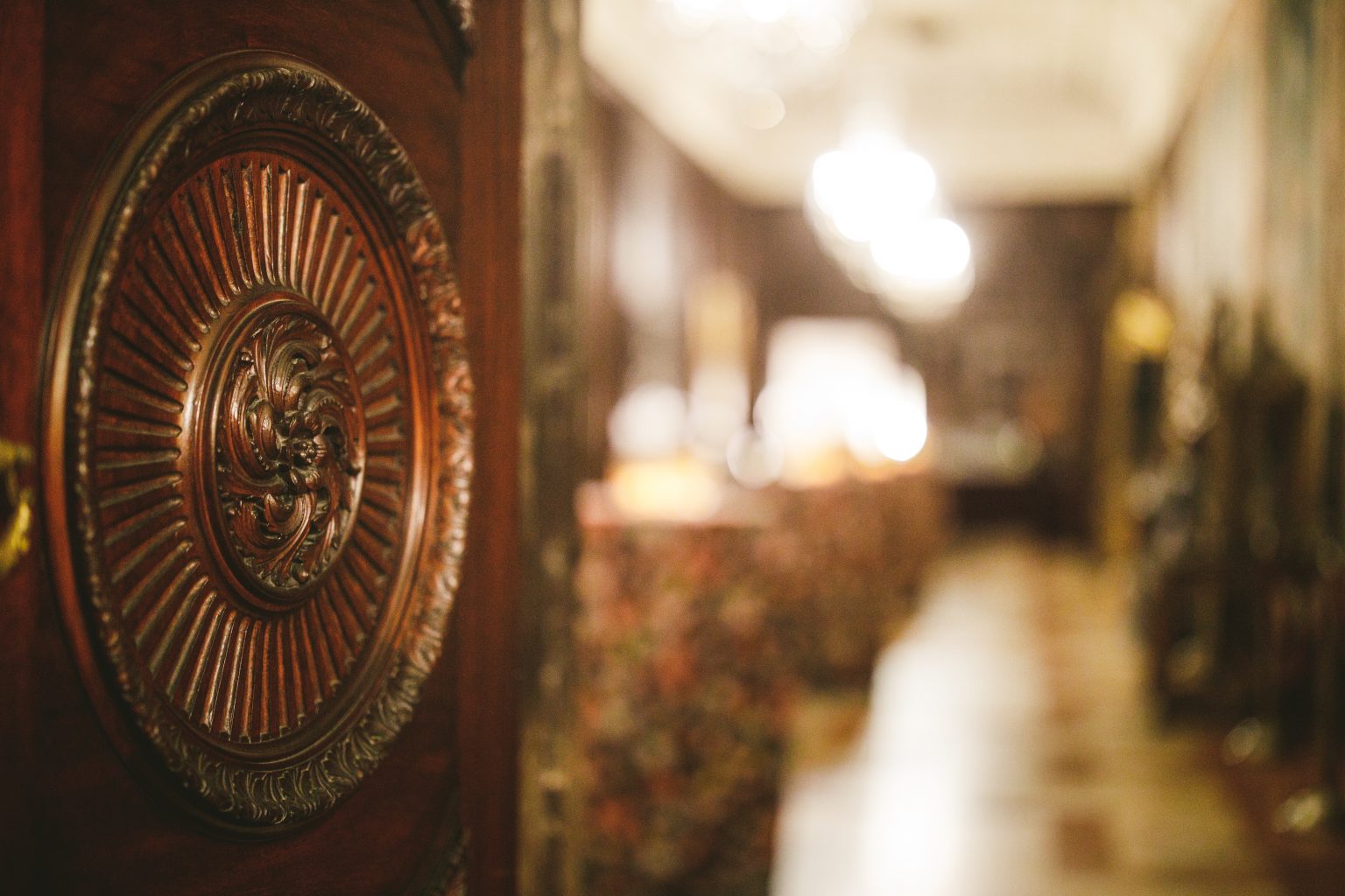 <h2>A hand carved door leads to cocktails</h2>Photo by Sam Hurd. SRS Events, planner.