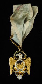 Gold Society of the Cincinnati Eagle insignia on a faded blue ribbon and owned by Allan McLane