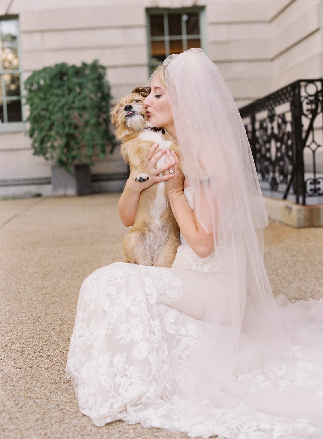 Bride and baby in the driveway. Photo by Laura Gordon.