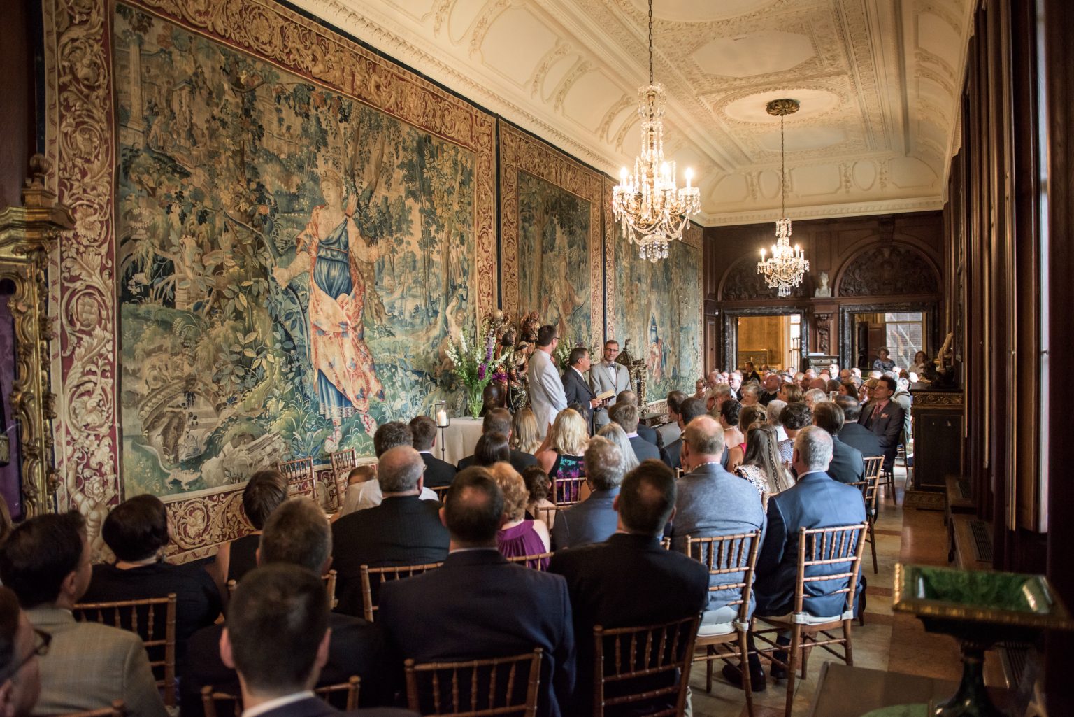 <h2>A ceremony centered against the tapestries</h2>Photo by Kevin Allen.