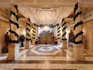 Holiday decorating in the Great Stair Hall. Photo by Sam Hurd.