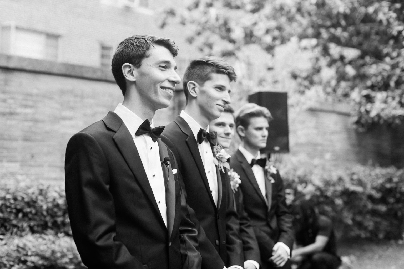 <h2>The groom awaits at the garden wall</h2>Photo by Sarah Bradshaw. Aimee Griffin, planner.