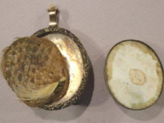 Click for a larger view. Contents of the back of the case of the portrait miniature of George Baylor, 1778