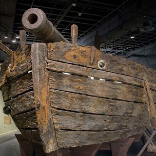 Bow of the wood gunboat Philadelphia with an iron cannon