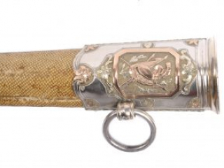 Detail of the silver mount at the opening of a shagreen scabbard