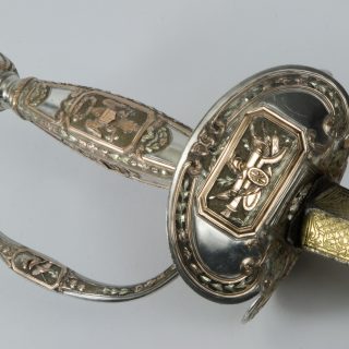 Silver and gold hilt of a Congressional presentation sword from the Revolutionary War