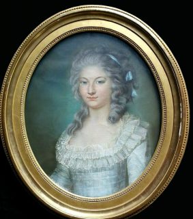 Oval eighteenth-century portrait of a woman in a gilded frame