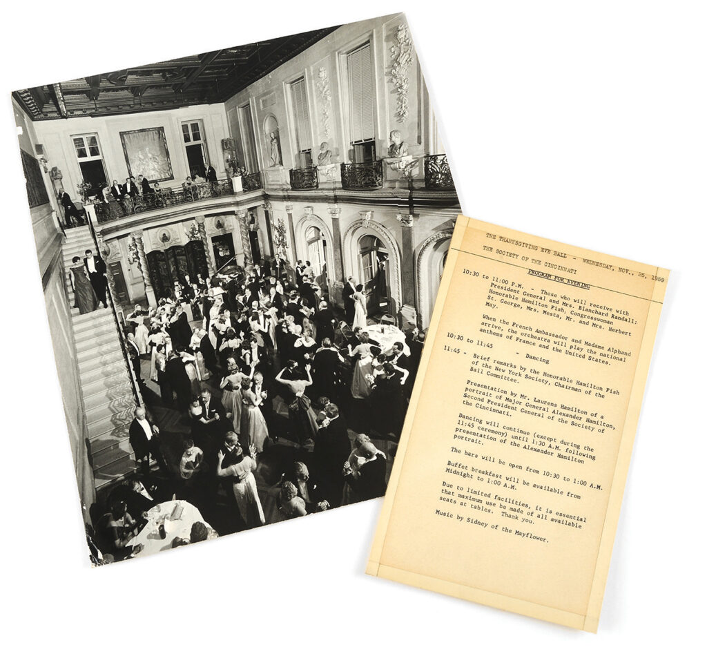 Black-and-white photograph of couples dancing in a Ballroom, with a typed program